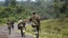 A column of Congolese M23 rebels on the Goma to Rushuru road, near Kibumba, north of Goma, DRC, November 27, 2012. 