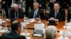 U.S. Secretary of State Mike Pompeo, right, and U.S. Ambassador to Russia Jon Huntsman, second left, listen to Russian Foreign Minister Sergey Lavrov, left, back to a camera, during their talks in the Black Sea resort city of Sochi, southern Russia, May 1