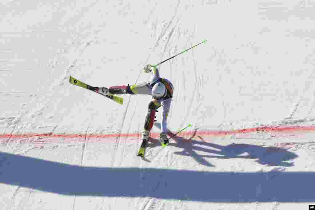 Norway's Sebastian Foss Solevaag crosses the finish line to win the men's slalom, at the Alpine Ski World Championships, in Cortina d'Ampezzo, Italy.