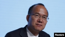 FILE - Billionaire Guo Guangchang, executive director and chairman of Fosun International, attends the annual general meeting of the Chinese conglomerate in Hong Kong, China, May 28, 2015. 