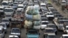 A traffic jam, one of five key issues Egyptian President Mohamed Morsi outlined in his Al Nhada (Renaissance) project, is pictured in old Cairo October 8, 2012, a day after his 100th day in power. 