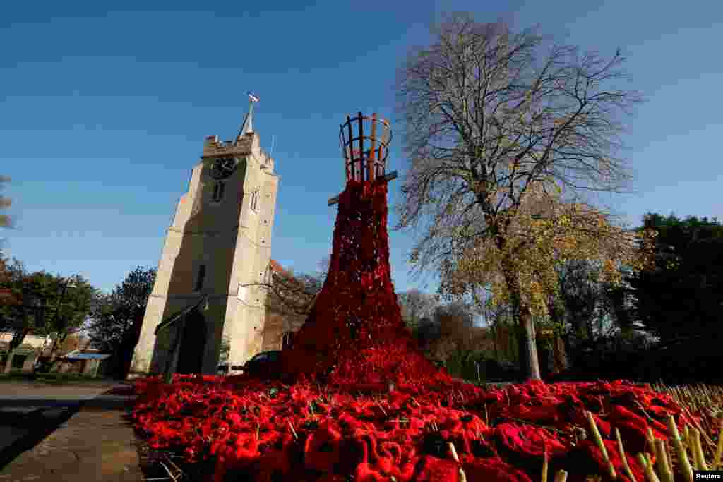 A poppy display is seen as part of remembrance commemorations in the Parish Church of St Peter & St Paul in Chatteris, Britain.
