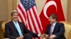 U.S. Secretary of State John Kerry (L) meets with Turkey's Foreign Minister Ahmet Davutoglu before attending the Association of Southeast Asian Nations (ASEAN) security meetings in Bandar Seri Begawan, July 2, 2013. 