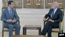 Suriye Devlet Başkanı Beşar Esat ve Uluslararası Kızıl Haç Komitesi başkanı Jacob Kellenberger