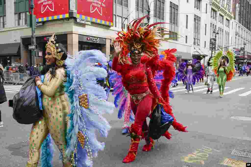 Performers walk off the set during a pre-taping of the Macy's Thanksgiving Day Parade in front of the flagship store in New York.
