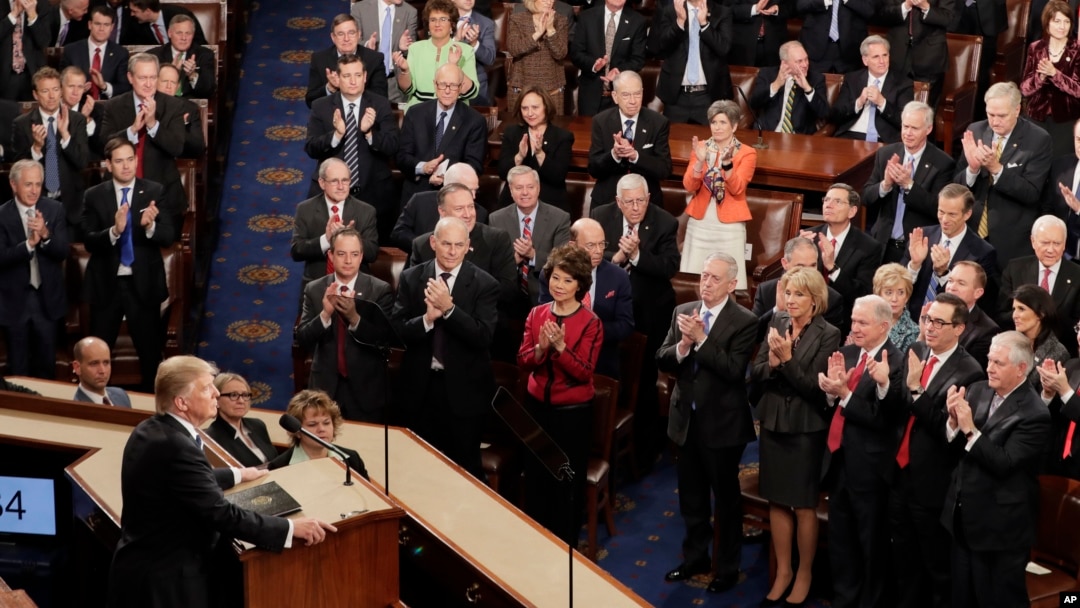 Republicans lawmakers applaud as President Donald Trump speaks to a joint session of Congress in Washington, Tuesday, Feb. 28, 2017. (AP Photo/J. Scott Applewhite)