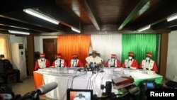 Ivory Coast's President of the Constitutional Council Mamadou Kone gives the final results of Ivory Coast's October 31 presidential election in Abidjan, Ivory Coast, November 9, 2020.