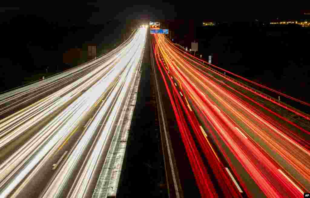 Traffic runs as usual on a highway in Frankfurt, Germany.