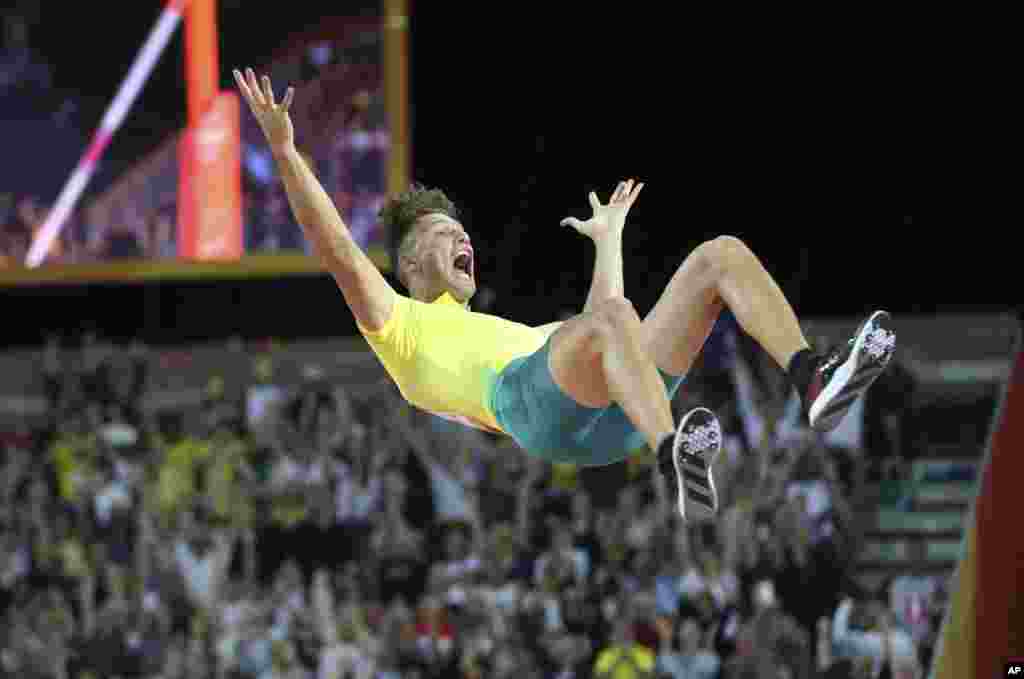 Gold medalist Australia's Kurtis Marschall competes in the men's pole vault final at Carrara Stadium during the Commonwealth Games on the Gold Coast, Australia, April 12, 2018.