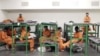 FILE - Inmates hang out on their bunks in the Harris County Jail in Houston, Texas.