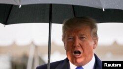 Президент Дональд Трамп розмовляє з журналістами перед відльотом у Лондон на саміт НАТО. Вашингтон 2 грудня 2019 р. 